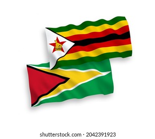 Banderas de ondulación de tela vectorial nacional de la República Cooperativa de Guyana y Zimbabwe aisladas sobre fondo blanco. de 1 a 2.