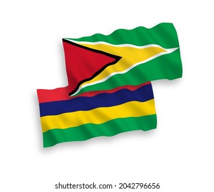 National vector fabric wave flags of Co-operative Republic of Guyana and Republic of Mauritius isolated on white background. 1 to 2 proportion.