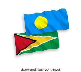 Banderas de olas de tela vectorial nacional de la República Cooperativa de Guyana y Palau aisladas en fondo blanco. de 1 a 2.