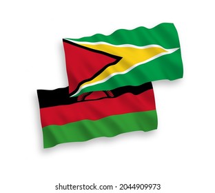National vector fabric wave flags of Co-operative Republic of Guyana and Malawi isolated on white background. 1 to 2 proportion.