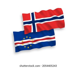 National vector fabric wave flags of Norway and Republic of Cabo Verde isolated on white background. 1 to 2 proportion.