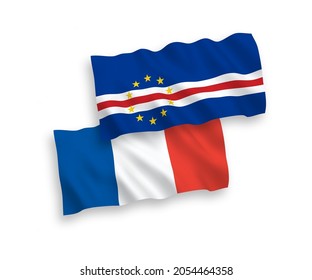 National vector fabric wave flags of France and Republic of Cabo Verde isolated on white background. 1 to 2 proportion.