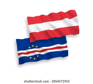 National vector fabric wave flags of Austria and Republic of Cabo Verde isolated on white background. 1 to 2 proportion.