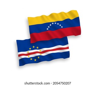 National vector fabric wave flags of Venezuela and Republic of Cabo Verde isolated on white background. 1 to 2 proportion.
