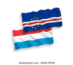 National vector fabric wave flags of Republic of Cabo Verde and Luxembourg isolated on white background. 1 to 2 proportion.