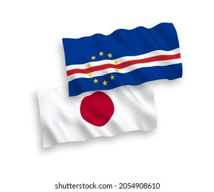 National vector fabric wave flags of Japan and Republic of Cabo Verde isolated on white background. 1 to 2 proportion.