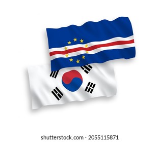 National vector fabric wave flags of South Korea and Republic of Cabo Verde isolated on white background. 1 to 2 proportion.