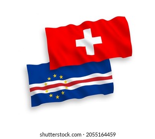 National vector fabric wave flags of Republic of Cabo Verde and Switzerland isolated on white background. 1 to 2 proportion.
