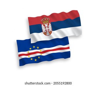 National vector fabric wave flags of Republic of Cabo Verde and Serbia isolated on white background. 1 to 2 proportion.
