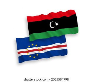 National vector fabric wave flags of Republic of Cabo Verde and Libya isolated on white background. 1 to 2 proportion.