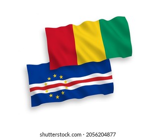 National vector fabric wave flags of Republic of Cabo Verde and Guinea isolated on white background. 1 to 2 proportion.
