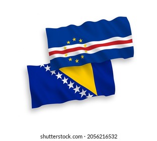 National vector fabric wave flags of Republic of Cabo Verde and Bosnia and Herzegovina isolated on white background. 1 to 2 proportion.