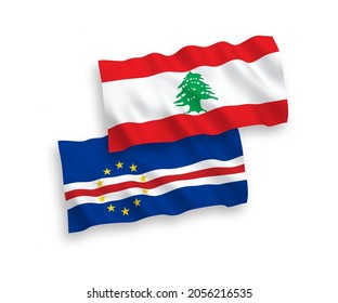 National vector fabric wave flags of Republic of Cabo Verde and Lebanon isolated on white background. 1 to 2 proportion.