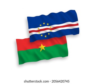 National vector fabric wave flags of Republic of Cabo Verde and Burkina Faso isolated on white background. 1 to 2 proportion.