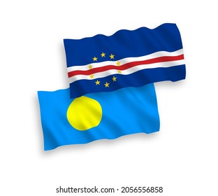 National vector fabric wave flags of Republic of Cabo Verde and Palau isolated on white background. 1 to 2 proportion.
