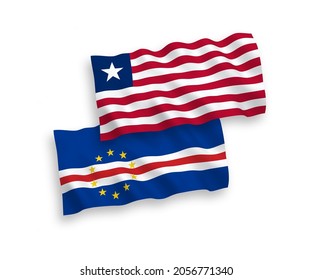 National vector fabric wave flags of Republic of Cabo Verde and Liberia isolated on white background. 1 to 2 proportion.