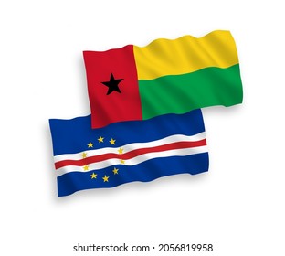 National vector fabric wave flags of Republic of Cabo Verde and Republic of Guinea Bissau isolated on white background. 1 to 2 proportion.