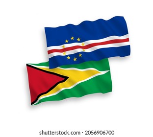 National vector fabric wave flags of Republic of Cabo Verde and Co-operative Republic of Guyana isolated on white background. 1 to 2 proportion.