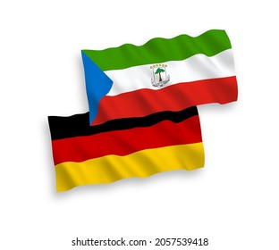 National vector fabric wave flags of Germany and Republic of Equatorial Guinea isolated on white background. 1 to 2 proportion.