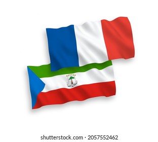 National vector fabric wave flags of France and Republic of Equatorial Guinea isolated on white background. 1 to 2 proportion.