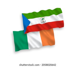 National vector fabric wave flags of Ireland and Republic of Equatorial Guinea isolated on white background. 1 to 2 proportion.