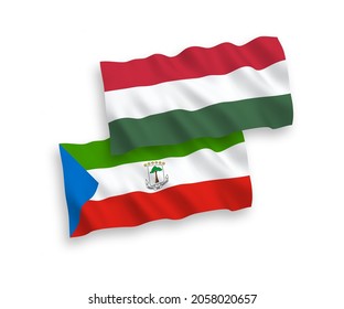 Nationale Vektor-Wellen-Flaggen der Republik Äquatorialguinea und Ungarns einzeln auf weißem Hintergrund. 1 bis 2 %.
