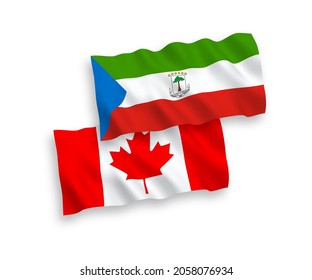National vector fabric wave flags of Canada and Republic of Equatorial Guinea isolated on white background. 1 to 2 proportion.