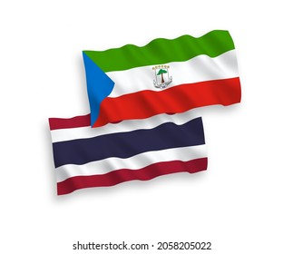 National vector fabric wave flags of Republic of Equatorial Guinea and Thailand isolated on white background. 1 to 2 proportion.