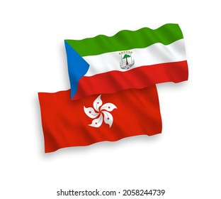 National vector fabric wave flags of Republic of Equatorial Guinea and Hong Kong isolated on white background. 1 to 2 proportion.