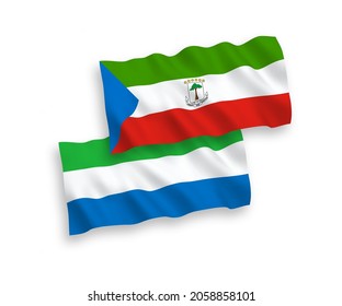 National vector fabric wave flags of Republic of Equatorial Guinea and Sierra Leone isolated on white background. 1 to 2 proportion.