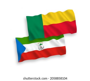 National vector fabric wave flags of Republic of Equatorial Guinea and Benin isolated on white background. 1 to 2 proportion.