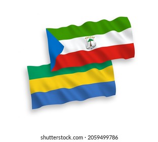 National vector fabric wave flags of Republic of Equatorial Guinea and Gabon isolated on white background. 1 to 2 proportion.
