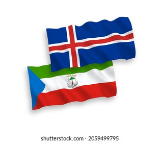 National vector fabric wave flags of Republic of Equatorial Guinea and Iceland isolated on white background. 1 to 2 proportion.