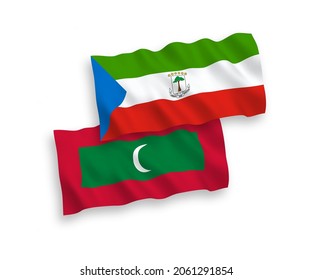National vector fabric wave flags of Republic of Equatorial Guinea and Maldives isolated on white background. 1 to 2 proportion.