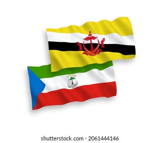 National vector fabric wave flags of Republic of Equatorial Guinea and Brunei isolated on white background. 1 to 2 proportion.
