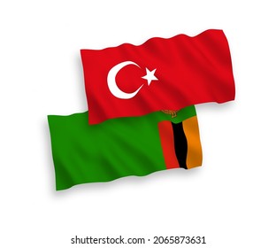 Banderas de olas de tela vectorial nacional de Turquía y la República de Zambia aisladas de fondo blanco. de 1 a 2.