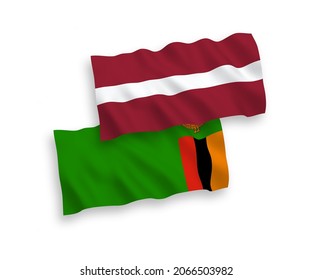 Banderas de olas de tela vectorial nacional de Letonia y la República de Zambia aisladas en fondo blanco. de 1 a 2.