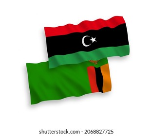 Nationale Vektor-Wellen-Flaggen der Republik Sambia und Libyen einzeln auf weißem Hintergrund. 1 bis 2 %.