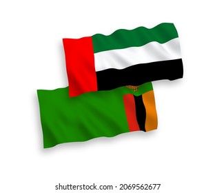 National vector fabric wave flags of Republic of Zambia and United Arab Emirates isolated on white background. 1 to 2 proportion.