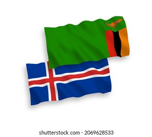 National vector fabric wave flags of Republic of Zambia and Iceland isolated on white background. 1 to 2 proportion.