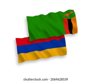 National vector fabric wave flags of Republic of Zambia and Armenia isolated on white background. 1 to 2 proportion.