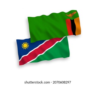 Banderas de olas de tela vectorial nacional de la República de Zambia y la República de Namibia aisladas en fondo blanco. de 1 a 2.