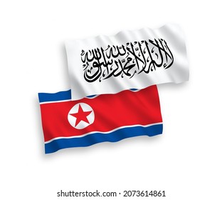 Banderas de ondulación de tela vectorial nacional de Corea del Norte y los talibanes aislados en un fondo blanco. de 1 a 2.