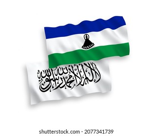 National vector fabric wave flags of Taliban and Lesotho isolated on white background. 1 to 2 proportion.