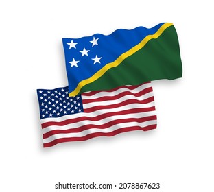 National vector fabric wave flags of Solomon Islands and USA isolated on white background. 1 to 2 proportion.
