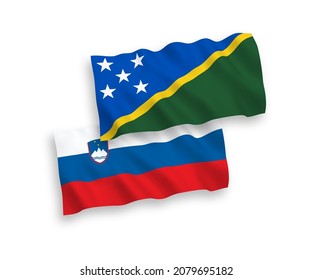 Banderas de olas de tela vectorial nacional de Eslovenia y las Islas Salomón aisladas en fondo blanco. de 1 a 2.