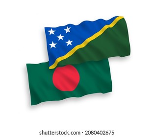 National vector fabric wave flags of Solomon Islands and Bangladesh isolated on white background. 1 to 2 proportion.
