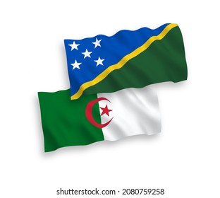 National vector fabric wave flags of Solomon Islands and Algeria isolated on white background. 1 to 2 proportion.