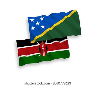 National vector fabric wave flags of Solomon Islands and Kenya isolated on white background. 1 to 2 proportion.