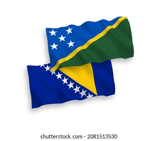 Banderas de olas de tela vectorial nacional de las Islas Salomón y Bosnia y Herzegovina aisladas en fondo blanco. de 1 a 2.